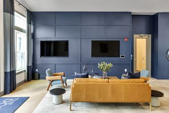Living room with brown couch